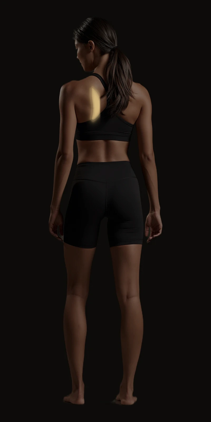 Standing figure, back view. Infraspinatus referral pattern along the inner edge of the shoulder blade.
