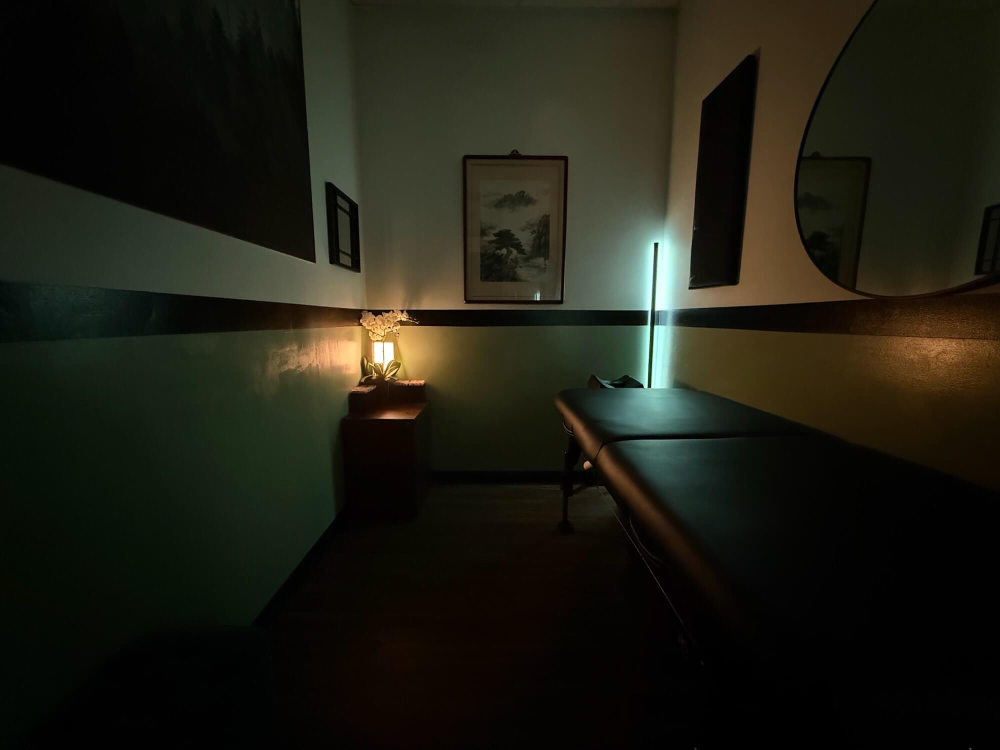 Treatment room with lights dimmed once needles are placed